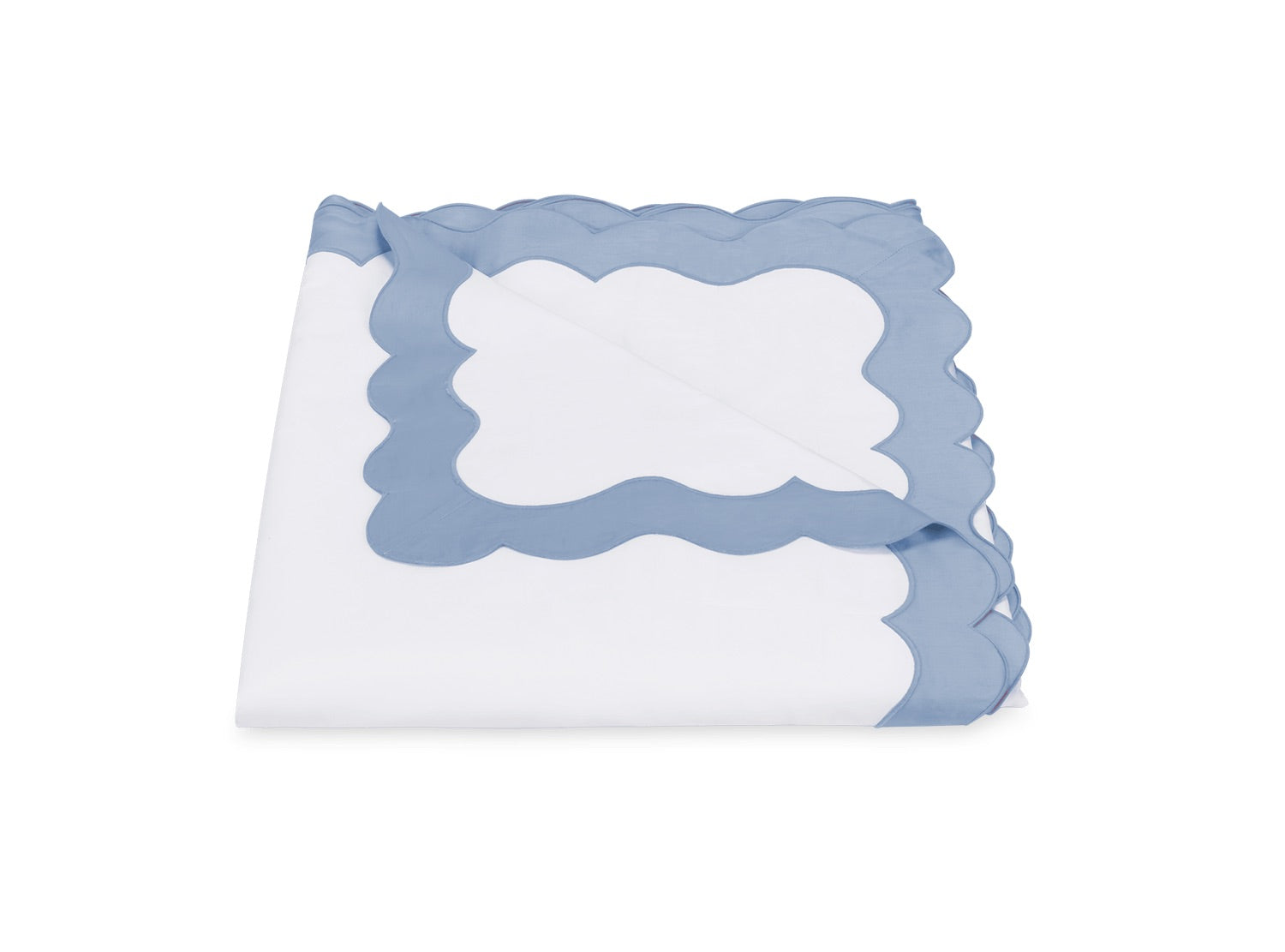 A white folded sheet from the Matouk Lorelei Bedding Collection—crafted from luxurious Egyptian cotton with a 600 thread count and adorned with an elegant blue appliqué scallop border—is neatly arranged on a plain white background.