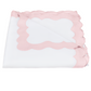 A folded white bedsheet with pink scalloped trim from the Lorelei Bedding Collection by Matouk, crafted in luxurious 600 thread count Milano Egyptian cotton, is displayed on a plain background.
