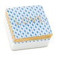 The Herend Love Box is a square porcelain box featuring hand-painted blue patterns, gold trim, and "LOVE" in gold letters—an elegant touch of luxury home decor.