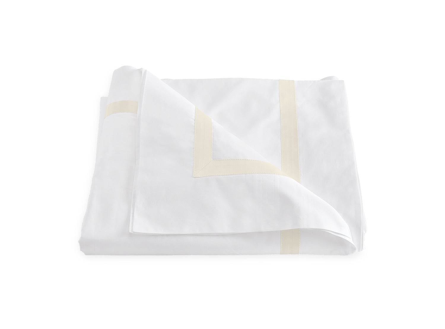 A folded white bedsheet from the Lowell Bedding Collection by Matouk, featuring elegant beige border detailing and crafted from luxurious 600 thread count Egyptian cotton percale, displayed on a plain white background.