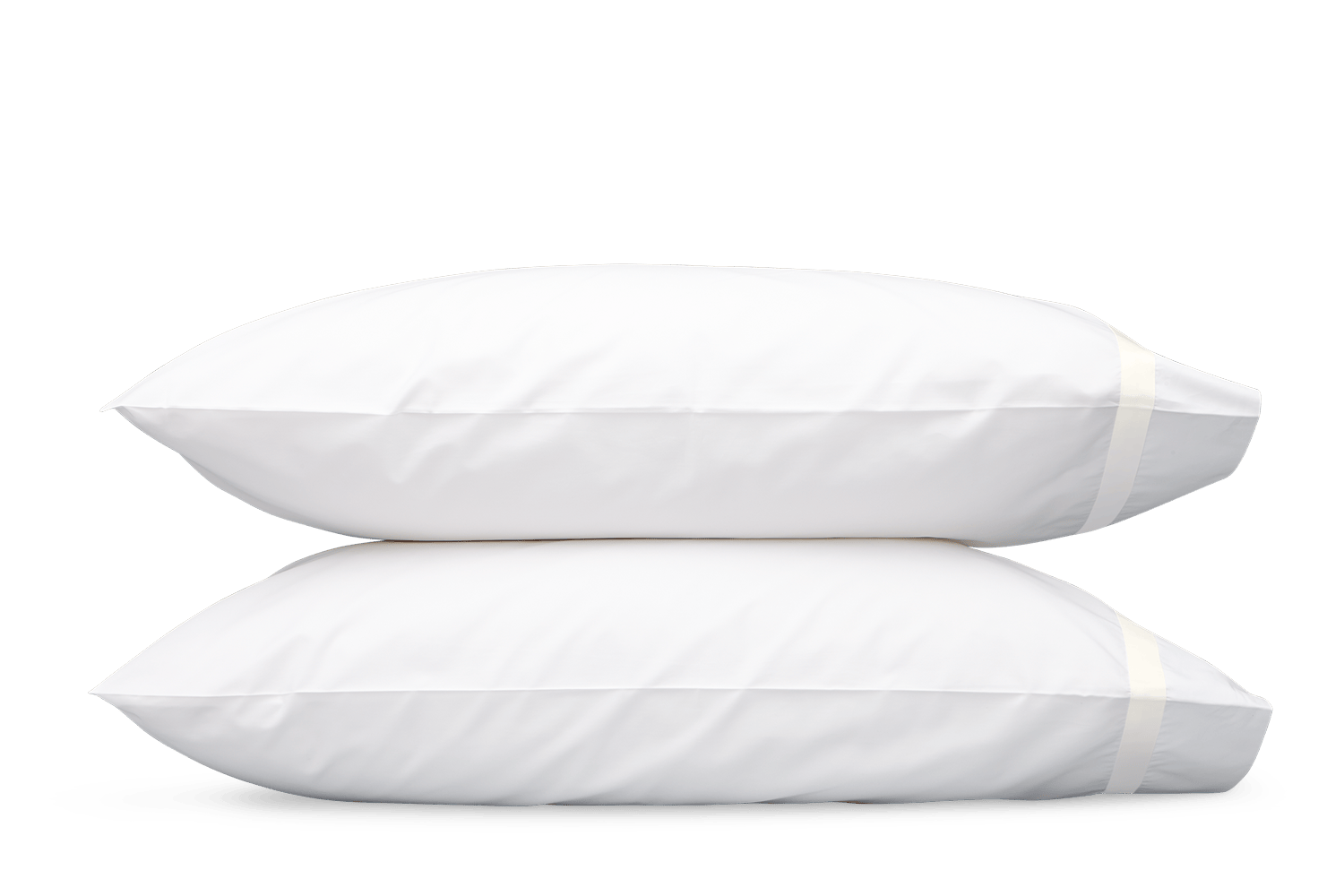 Two ivory pillows from the Lowell Bedding Collection by Matouk are stacked together against a plain white background.