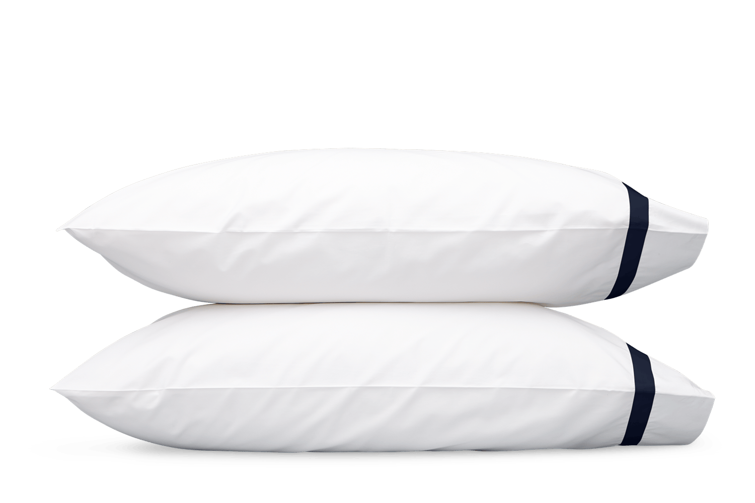 Two white pillows with dark blue edging from the Matouk Lowell Bedding Collection in Navy are stacked together against a white background, crafted from luxurious 600 thread count Egyptian cotton percale.
