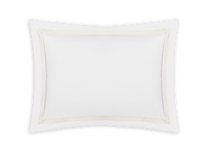 The Matouk Lowell Bedding Collection pillowcase in ivory features a rectangular shape with a thin beige sateen tape border, crafted from luxurious Egyptian cotton percale, and is shown on a plain white background.