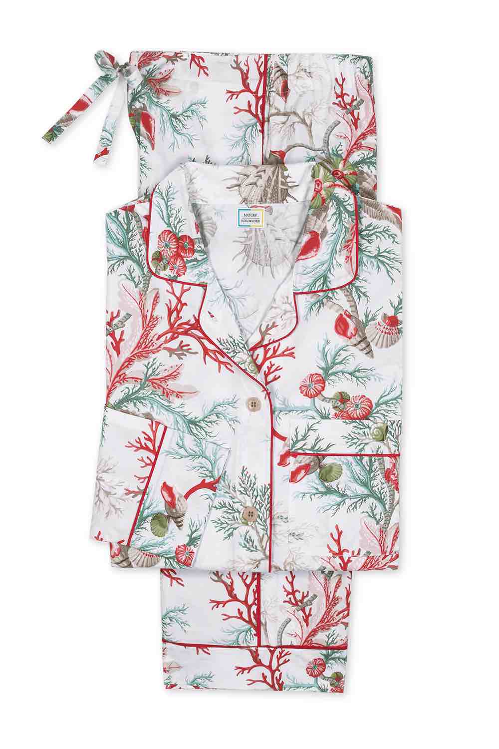 The Matouk Luca Pajama Set features premium cotton percale with a red and green coral and seashell print, detailed with red piping on the collar, pockets, and cuffs—ideal for those who appreciate luxury sleepwear.