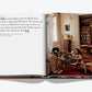 A chic open book by Assouline, titled "Madrid Chic," depicts a woman lounging in a cozy room with a bookshelf and large windows. The left page captures the essence of Madrid's history and literature, reflecting the Spanish way of life.