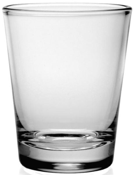 A clear, handmade glass tumbler from the William Yeoward Crystal Maggie Collection stands upright against a white background, highlighting its historic bold shape.