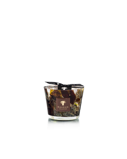 Baobab Collection Halona Yellow World hand-blown glass candle vessel with a swirling brown, gold, and black pattern, branded label, and black ribbon tied around the rim.