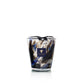 Baobab Collection Halona Blue World hand-blown glass candle holder with a marbled blue, black, and white pattern, featuring a navy blue label with a gold tree icon and text.