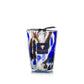 Baobab Collection Halona Blue World hand-blown glass candle featuring a blue, black, and white marbled pattern, a branded label, and a woody fragrance.