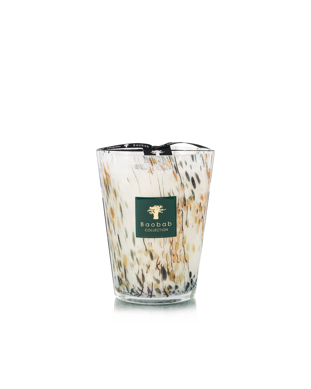 Baobab Collection Halona White World Candle, a hand-blown glass vessel with brown and black flecks, featuring a dark green square label with a tree logo and artisan fragrance text.