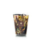 Baobab Collection Halona Yellow World hand-blown glass candle holder with a yellow, brown, and black mottled pattern and a brown square label featuring a tree icon and text.