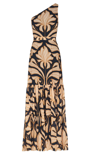 Introducing the Andres Otalora Miramar Dress: a stunning one-shoulder maxi dress with a bold, ornate tan and black pattern, featuring a fitted bodice and a tiered skirt.