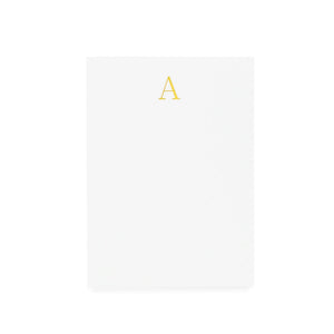 Small white Sugar Paper Gold Initial Mini Notepad featuring a gold letter “A” at the top.