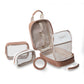 The Marbella Mocha Travel Collection by Stephanie Johnson is displayed open, revealing interior pockets. Three matching transparent cosmetic pouches and a circular accessory are arranged beside this versatile makeup bag.