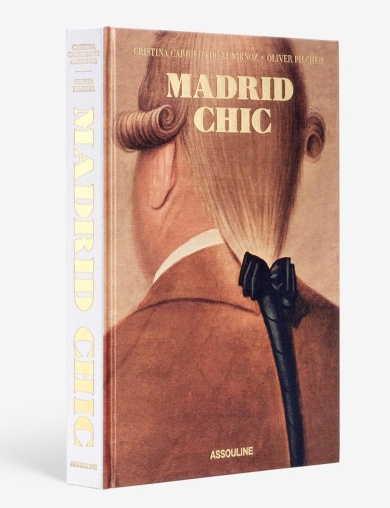 The cover of "Madrid Chic" by Assouline features an illustration of a person with a vintage hairstyle and hair bow, capturing Spanish cultural expression.