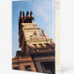 The cover image of Assouline's "Madrid Chic" captures the essence of Spanish life, featuring a building with statues and architectural details set against a vibrant blue sky.