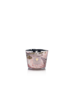 The Baobab Collection Leaves Manon Candle by Baobab features a pink and white marbled hand-blown glass design with a gold label, scented with blackcurrant, rose, and sandalwood notes, shown against a plain white background.