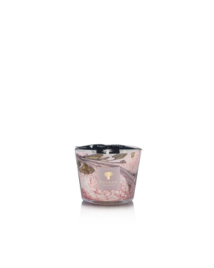 The Baobab Collection Leaves Manon Candle by Baobab features a pink and white marbled hand-blown glass design with a gold label, scented with blackcurrant, rose, and sandalwood notes, shown against a plain white background.