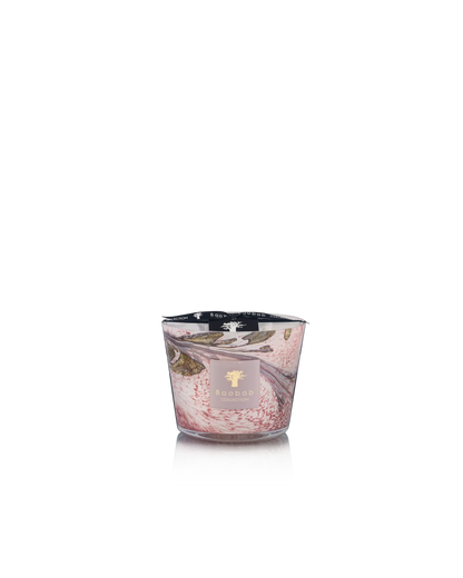 The Baobab Collection Leaves Manon Candle by Baobab features a pink and white marbled hand-blown glass design with a gold label, scented with blackcurrant, rose, and sandalwood notes, shown against a plain white background.