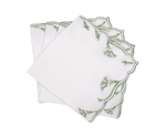 A set of four Marcella Napkins by Matouk, featuring white fabric with green embroidered leaf motifs and scalloped edges, displayed fanned out on a white background.