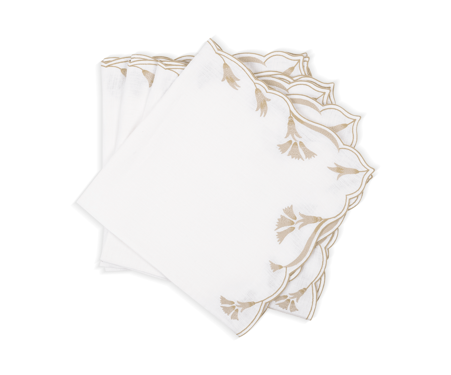 The Marcella Napkin Set by Matouk features three white cloth napkins with scalloped edges and beige embroidered leaf patterns, neatly stacked on a white background.