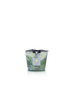 The Baobab Collection Leaves Marius Candle by Baobab features a green and white patterned hand-blown glass with a black ribbon, displayed on a white background—capturing the essence of Provence.