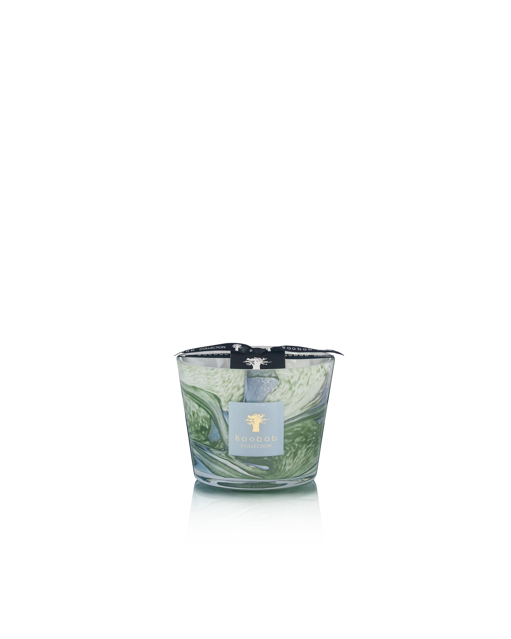 The Baobab Collection Leaves Marius Candle by Baobab features a green and white patterned hand-blown glass with a black ribbon, displayed on a white background—capturing the essence of Provence.