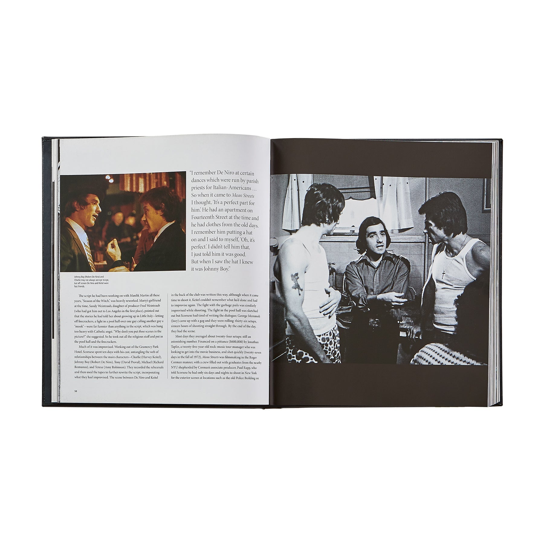 An open copy of "Martin Scorsese: A Retrospective" by Graphic Image displays a text page with a color photo on the left and, on the right, a black-and-white image of four men conversing—capturing cinematic history.