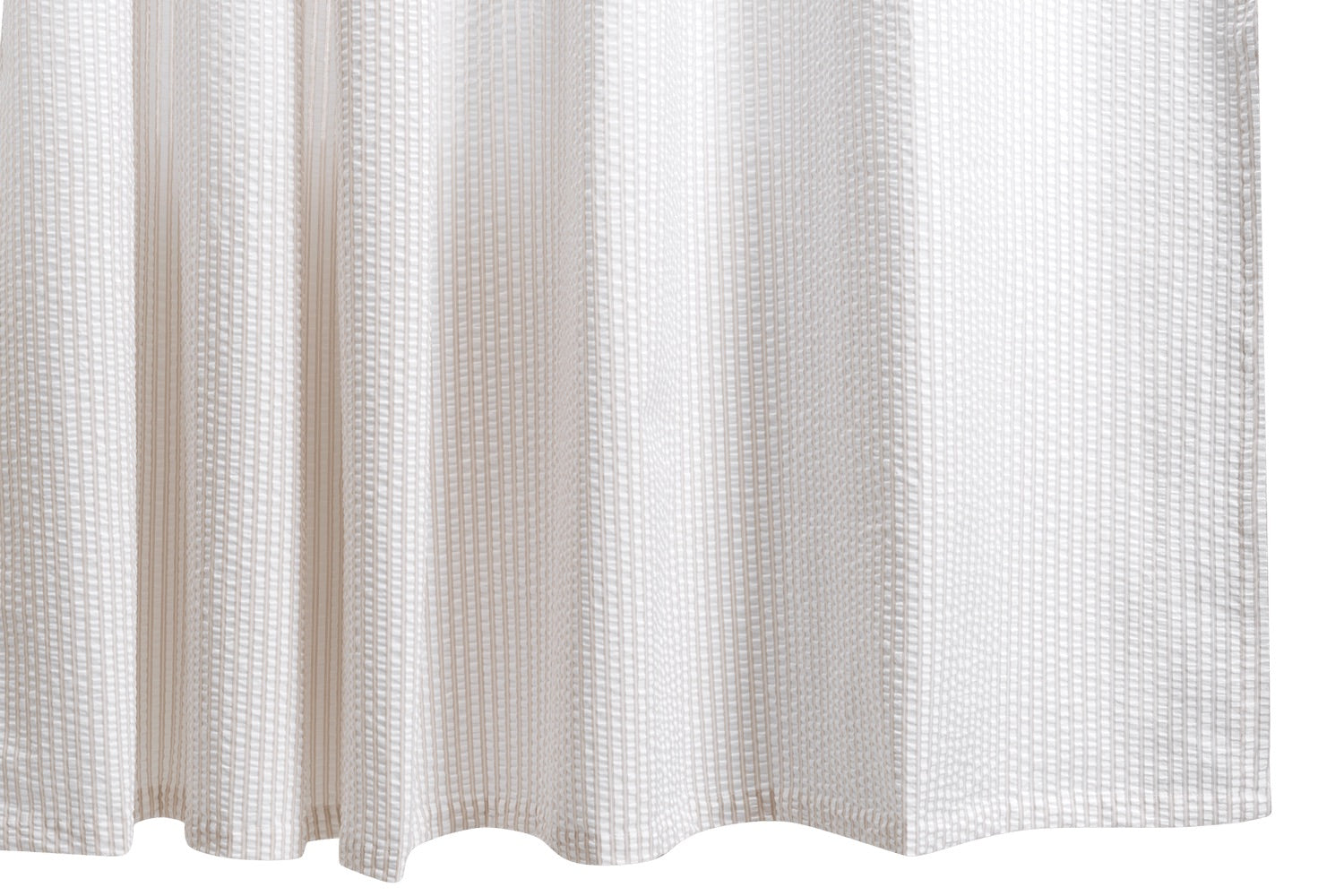 Close-up of the Matteo Shower Curtain Collection by Matouk, featuring a white seersucker fabric with a subtle grid-like pattern and menswear-inspired style, hanging straight down.