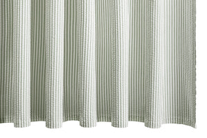 The Matouk Matteo Shower Curtain Collection features a white and light gray seersucker design with vertical stripes and a waffle-like texture inspired by classic menswear style.