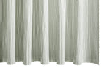 The Matteo Shower Curtain Collection by Matouk features a light gray-green shower curtain with a vertical textured pattern inspired by menswear style, displayed here in elegant, soft folds.
