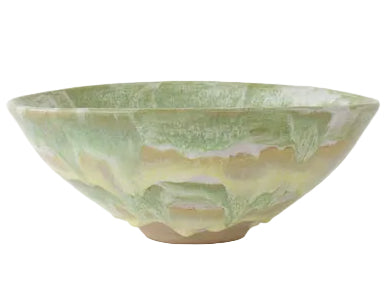 The Geode Bowl Collection by Paul Schneider Ceramics features wide, shallow ceramic bowls with striking green marbled swirls—ideal for adding unique flair to your home decor.