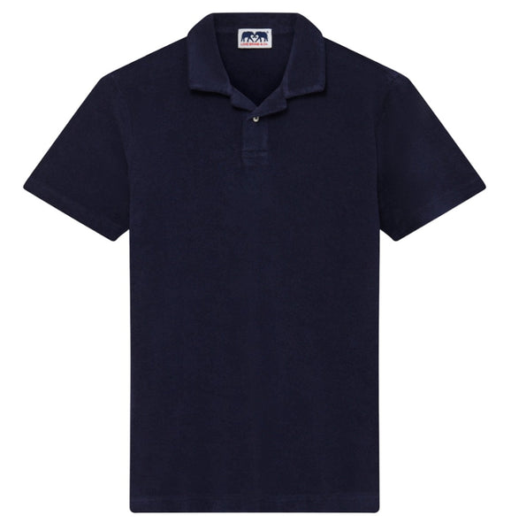 Love Brand & Co. Navy blue Powell terry polo shirt displayed against a plain background, featuring a collar, a three-button placket, and a small logo at the chest.