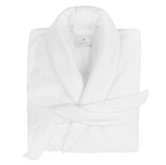 The White Milagro Robe by Matouk is neatly folded with a waist belt, features a branded collar label, and is OEKO-TEX certified for peace of mind.
