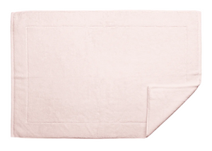 The Matouk Milagro Bath Collection in Petal is a rectangular light pink cotton towel, renowned for its softness and excellent absorbency, shown with a folded corner on a white background.