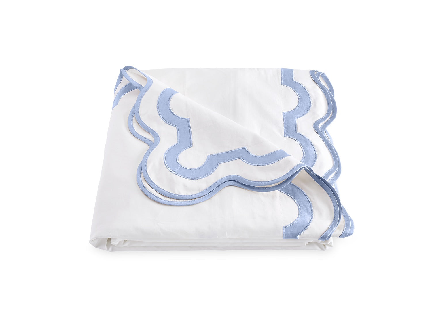 A folded white blanket from the Matouk Mirasol Bedding Collection, featuring decorative light blue trim and scalloped edges, crafted from luxurious 600 thread count Egyptian cotton percale, displayed on a plain white background.