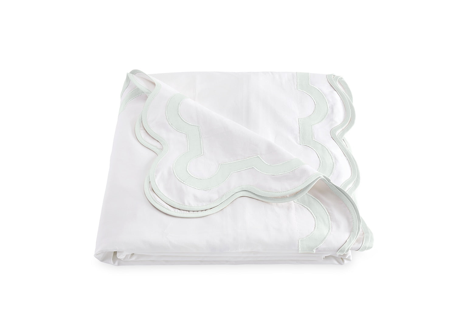 A neatly folded white sheet from the Matouk Mirasol Bedding Collection, featuring elegant light green trim and a scalloped edge, expertly crafted from luxurious 600 thread-count Egyptian cotton percale, displayed on a plain white background.