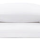 Two pillows from the Mirasol Bedding Collection by Matouk, crafted from luxurious white Egyptian cotton percale with a 600 thread count, are stacked atop one another. Each pillow features a distinctive green decorative trim on one end, set against a crisp white background.