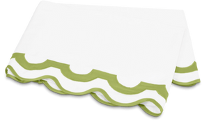 The Mirasol Bedding Collection, Grass by Matouk features crisp white bedding with a scalloped green border, crafted from luxurious Egyptian cotton percale for a refined look.