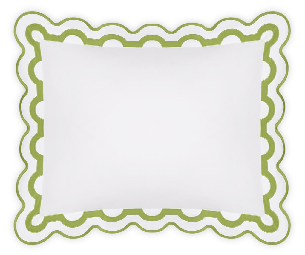 The Mirasol Bedding Collection pillowcase by Matouk features a scalloped green border and circular cutout pattern, expertly crafted in Italy from luxurious 600 thread count Egyptian cotton percale, and shown on a plain white background.