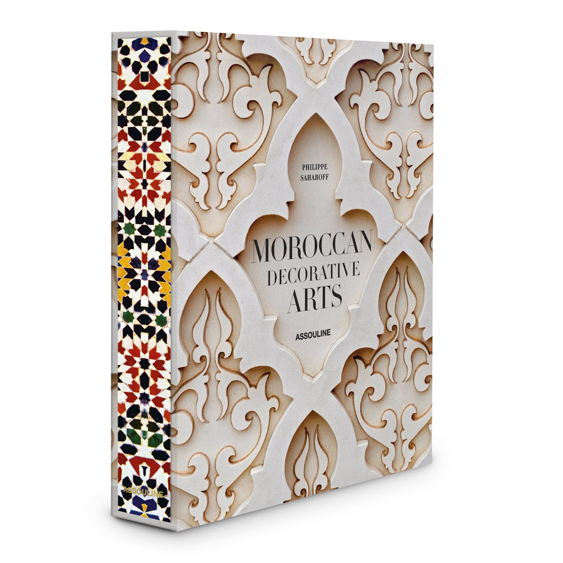 A book titled "Moroccan Decorative Arts" by Philippe Saharoff, advertised by Assouline, featuring a cover with traditional Moroccan pattern design that highlights local craftsmanship.
