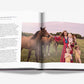 An open copy of Assouline’s "Mother and Child" displays a Claiborne Swanson Frank portrait of a woman with three children and three horses in a grassy field, opposite printed text—a tribute to modern motherhood.