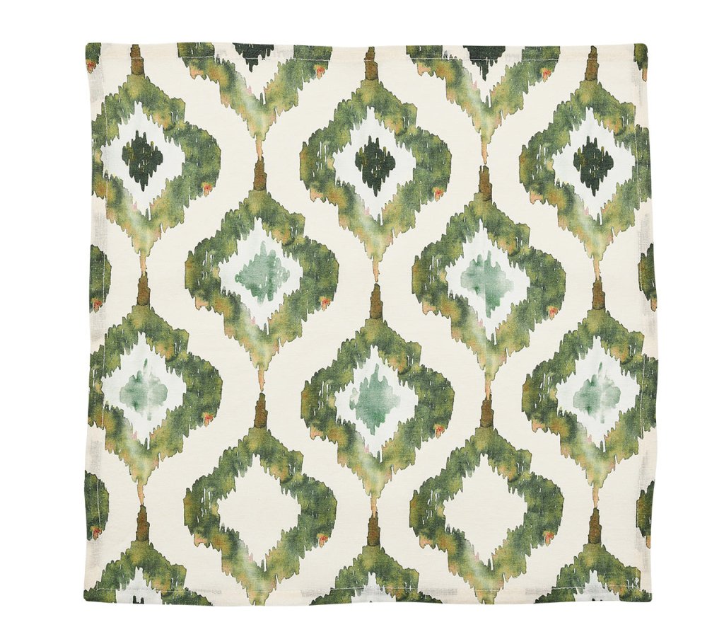 The Watercolor Ikat Napkin Set by Kim Seybert features square fabric napkins with a green and white diamond abstract design on a cream background, reminiscent of hand-painted Ikat patterns.