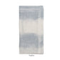 A folded napkin from the Kim Seybert Watercolor Stripe White/Blue Linen Collection, featuring a subtle blue and white gradient, is displayed on a white background. "Napkin" is printed below.