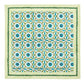 The Majorelle Napkin Set by Kim Seybert features a floral and geometric pattern in blue, green, and yellow, accented with diagonal yellow stripes and a green zigzag border, inspired by handcrafted napkins and Indian block printing.