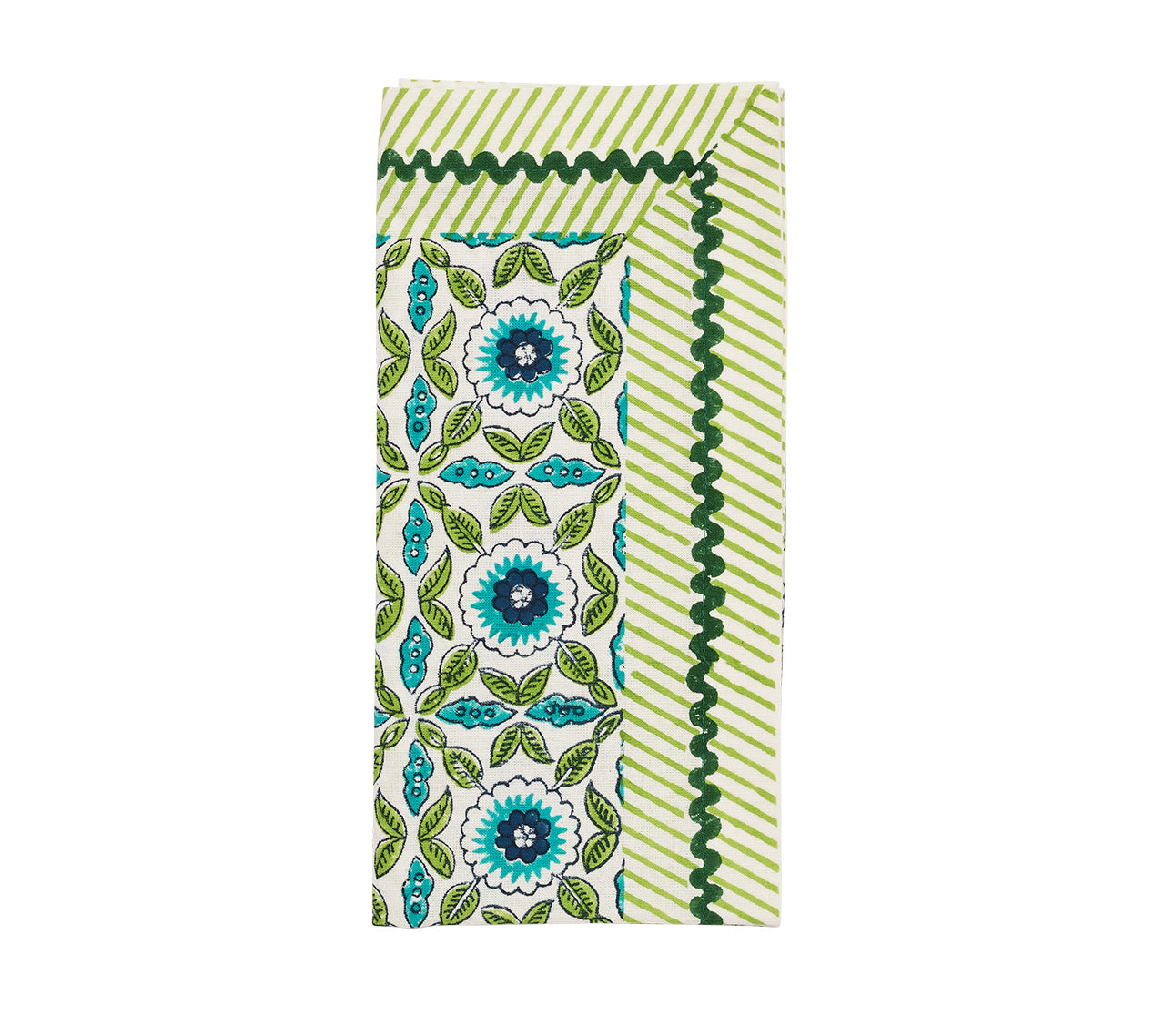 The Kim Seybert Majorelle Napkin Set features a folded napkin with green, blue, and white floral and leaf patterns, a striped border, and green rickrack trim, inspired by Indian block printing for an artisanal feel.