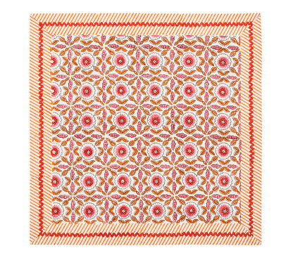 The Majorelle Napkin Set by Kim Seybert features a geometric floral pattern in red, pink, and orange with diagonal red borders, inspired by Indian block printing to add artisanal charm to your table.