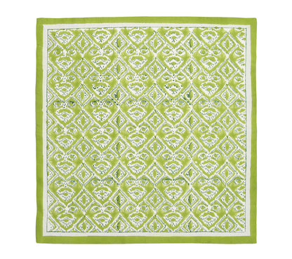 The Kim Seybert Alfresco Napkin Set features green and white rectangular napkins with a repeating diamond pattern, stylized woven designs, block printing details, and a solid green border.