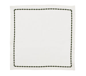 The Swag Napkin Set by Kim Seybert features white linen napkins with a green embroidered leaf border, adding elegance and versatility to any table setting.