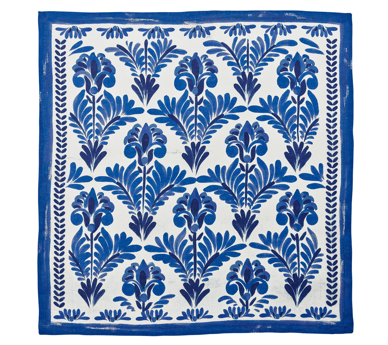 The Kim Seybert Botanica Napkin Set features rectangular linen napkins with a blue floral print and matching border on white—a stylish, vintage-inspired table decor accent.